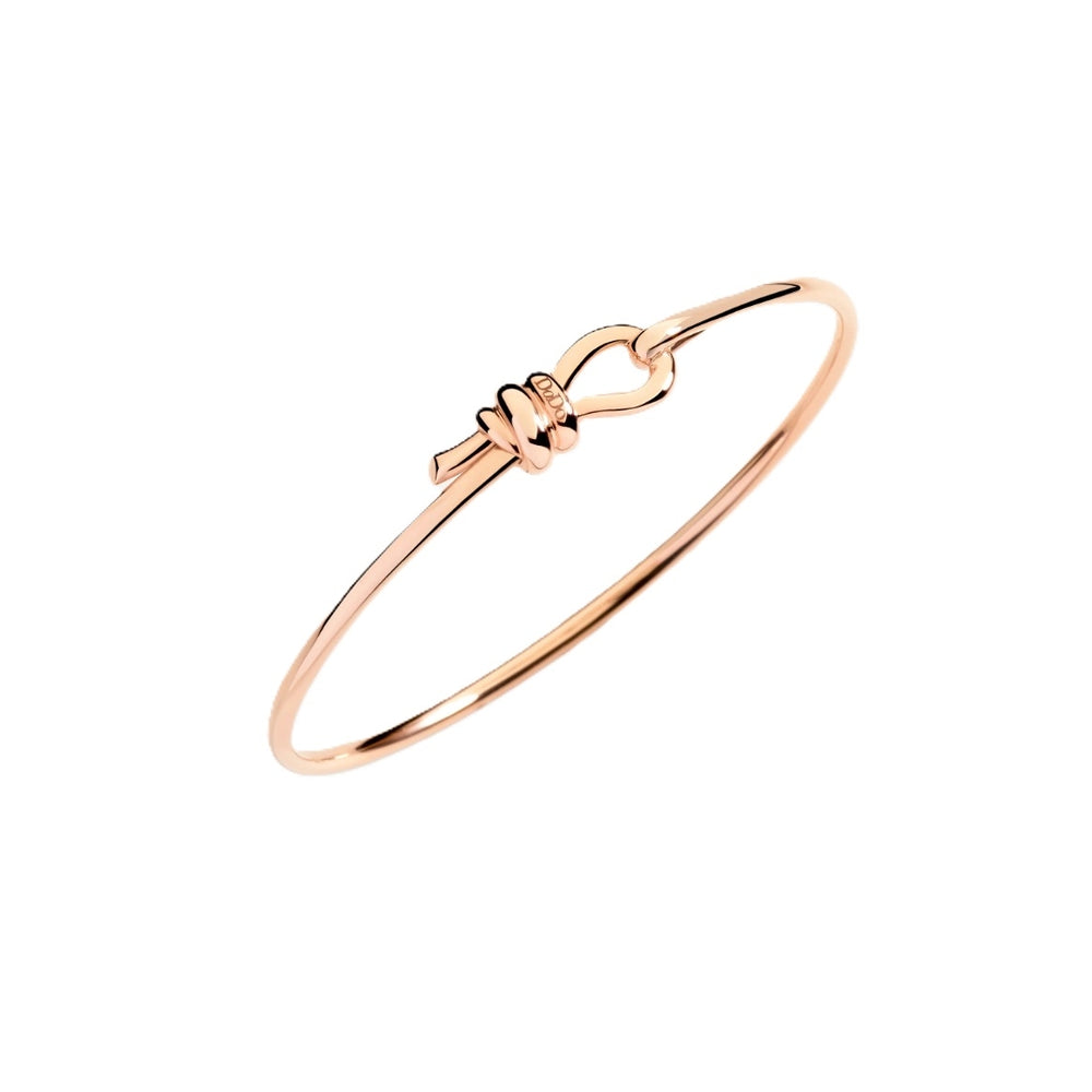 BRACCIALI DODO MOD. DBC4012KNOT00009RS elegant gold bracelet with knot design on white background.