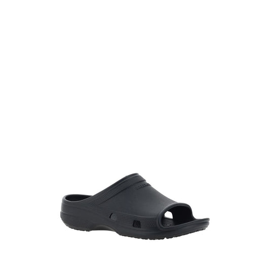 Balenciaga Eva Sandals with unique rubber design, open toe, embossed logo, stylish footwear for SS25, 100% rubber composition.