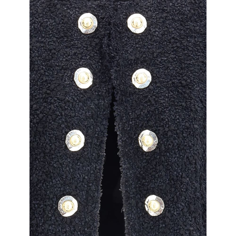 Close-up of Balmain Black Polyamide Coat with gold buttons, displaying luxury and elegance in design.