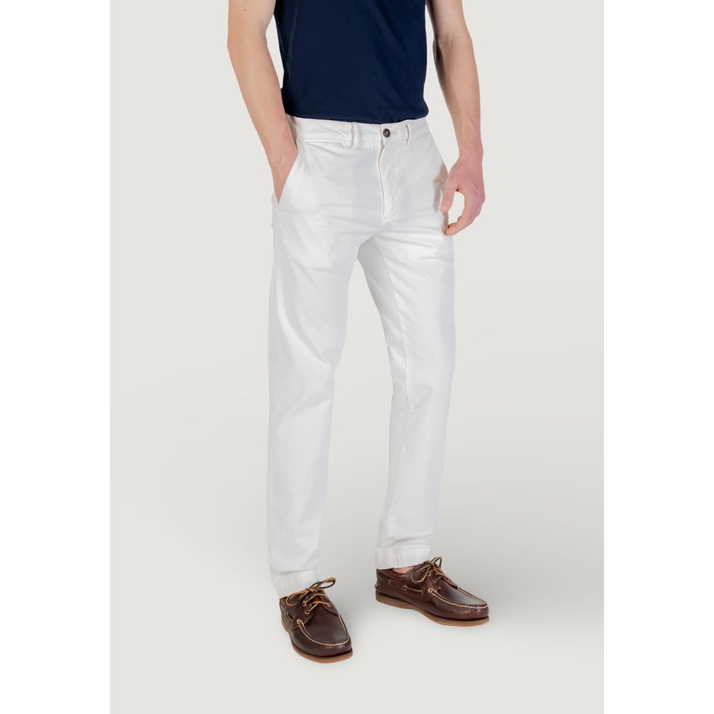 Man wearing Borghese White Cotton Skinny Pants with brown shoes