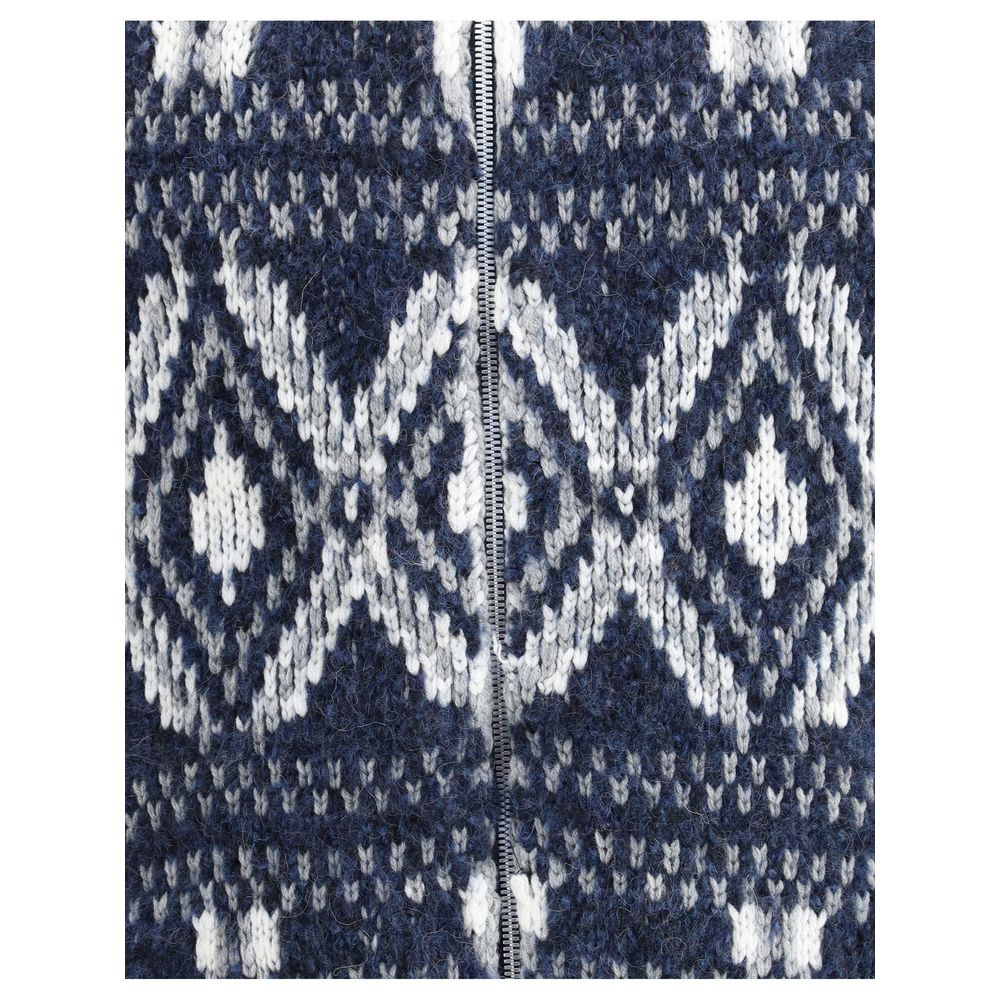 Close-up of Brunello Cucinelli Blue Alpaca Vicugna Pacos Cardigan geometric knit design and zipper detail.