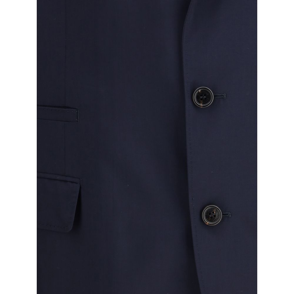 Close-up of Brunello Cucinelli Blue Wool Blazer with button detail, showcasing high-quality wool and silk blend fabric.