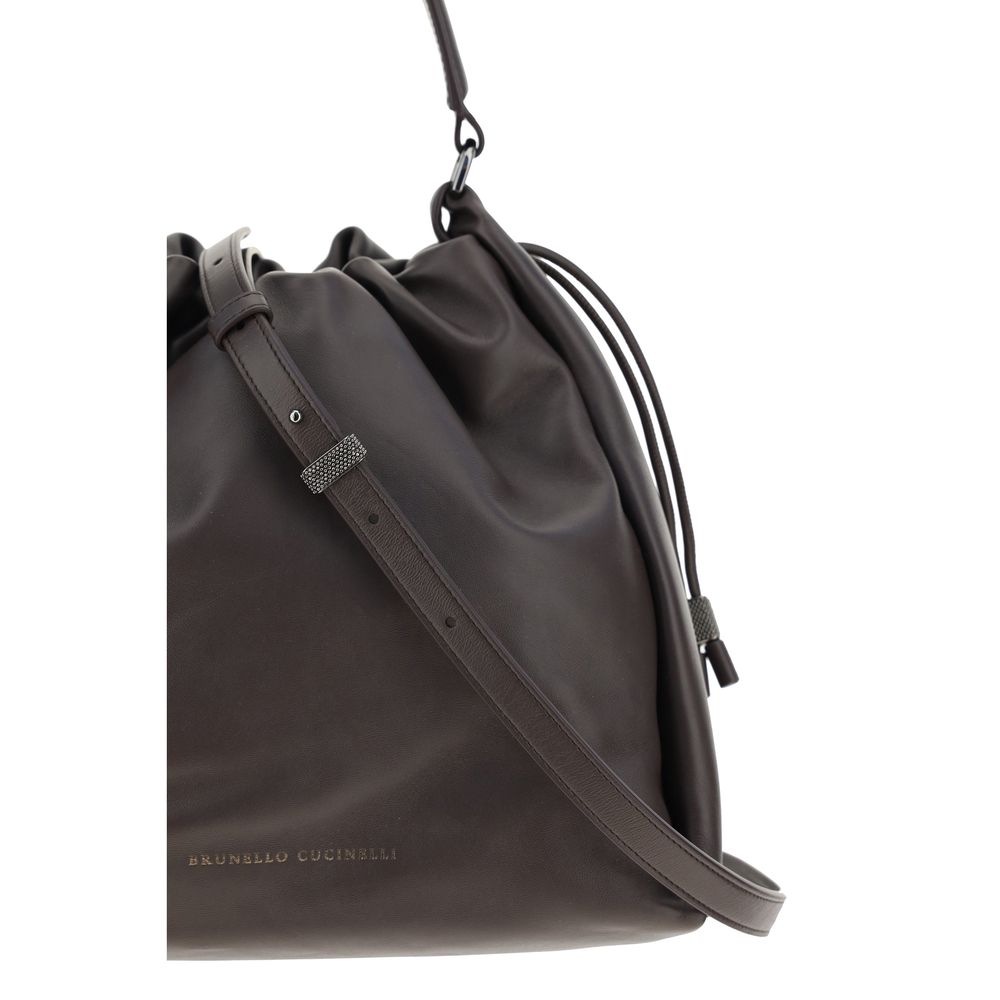 Brunello Cucinelli Brown Calf Leather Bos Taurus Shoulder Bag with adjustable handle, drawstring closure, and brand signature on front