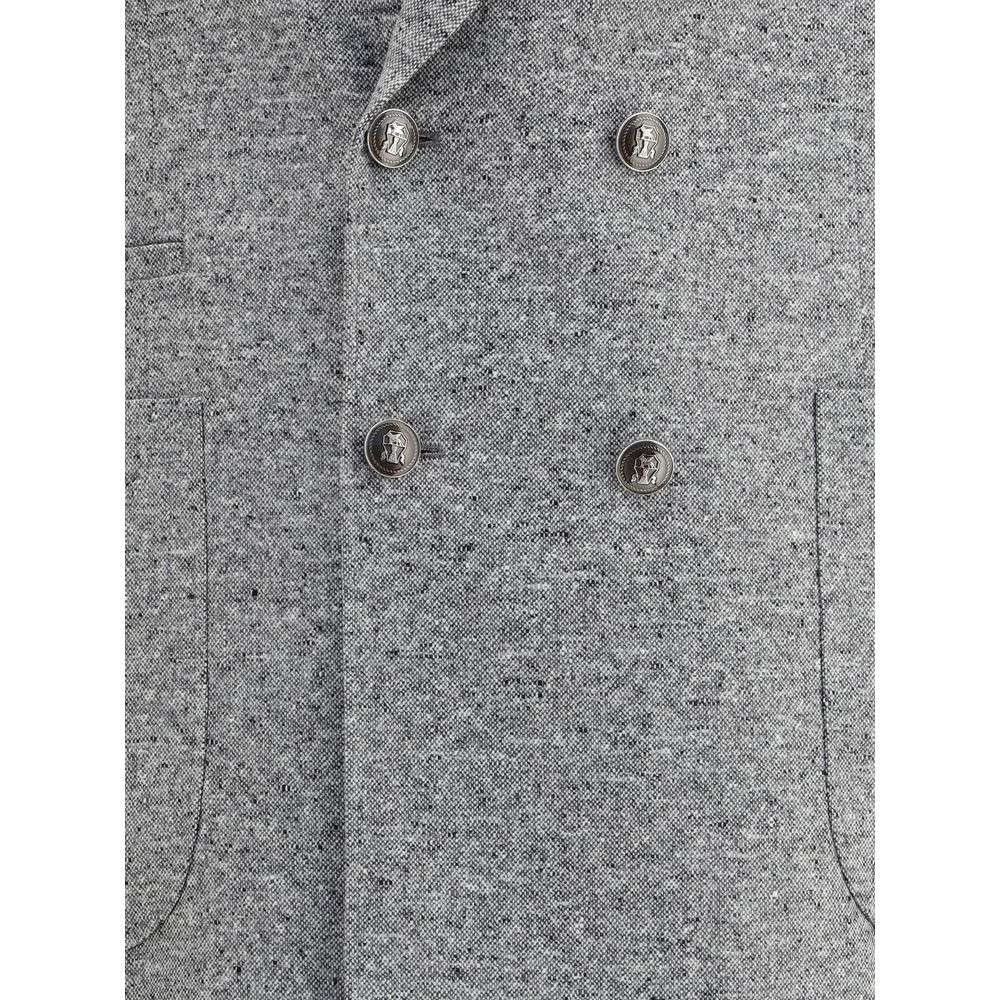 Close-up of Brunello Cucinelli Gray Wool Two-Piece Suit with metal buttons and patch pockets.