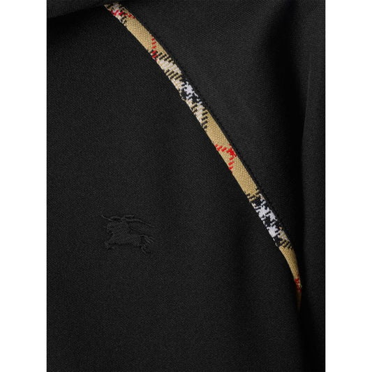 Burberry Cotton blend zip-up hoodie with check trim, black with Equestrian Knight motif and zip, close-up of fabric and trim detail.