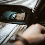 CASIO EDIFICE Mod. STANDARD CHRONOGRAPH - CHAMPAGNE watch reflected in car mirror