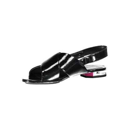 Calvin Klein Black Leather Women Sandal with a subtle 1cm heel and elegant crossed front featuring the iconic logo, epitome of minimalist chic.
