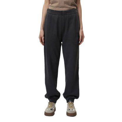 Woman wearing Calvin Klein Jeans Gray Cotton Joggers (Workout Pants) with elastic waistband for comfort and style.