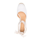 Castañer Castaner Flat shoes White, top view of off-white platform espadrille with almond toe and tie-detail, featuring braided raffia.
