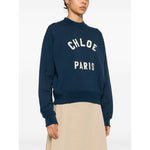 Chloé Chloè Sweaters Blue cotton jersey with logo patch, mock neck, long sleeves, straight hem; model wearing size S, true to size fit.