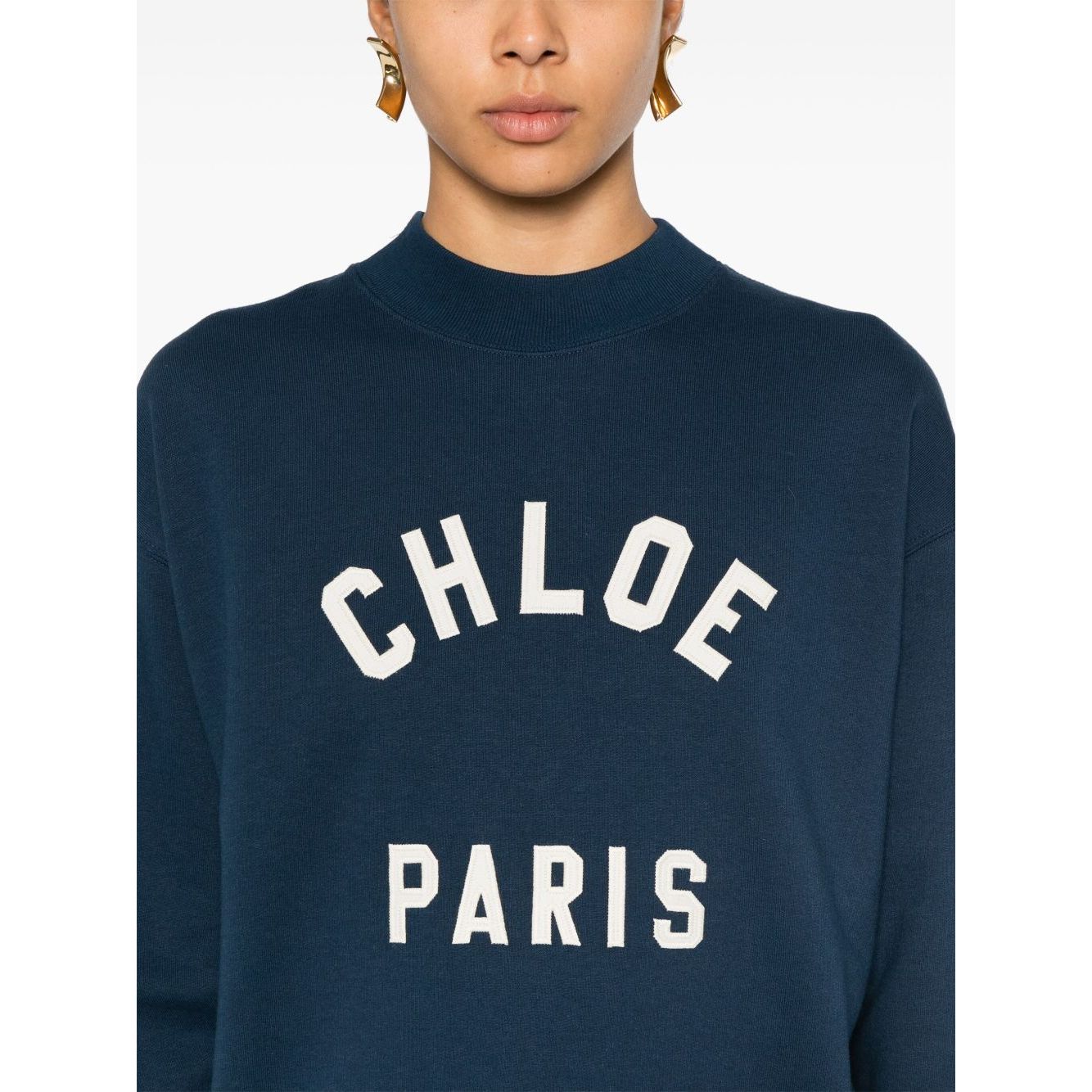 Chloé Chloè Sweaters Blue, blue cotton jersey sweatshirt with logo patch and mock neck, showcasing front view of model wearing size S.