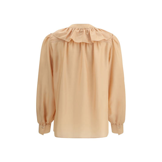 Back view of Chloé Ruffle Shirt in silk, featuring mother-of-pearl buttons and elegant ruffles.
