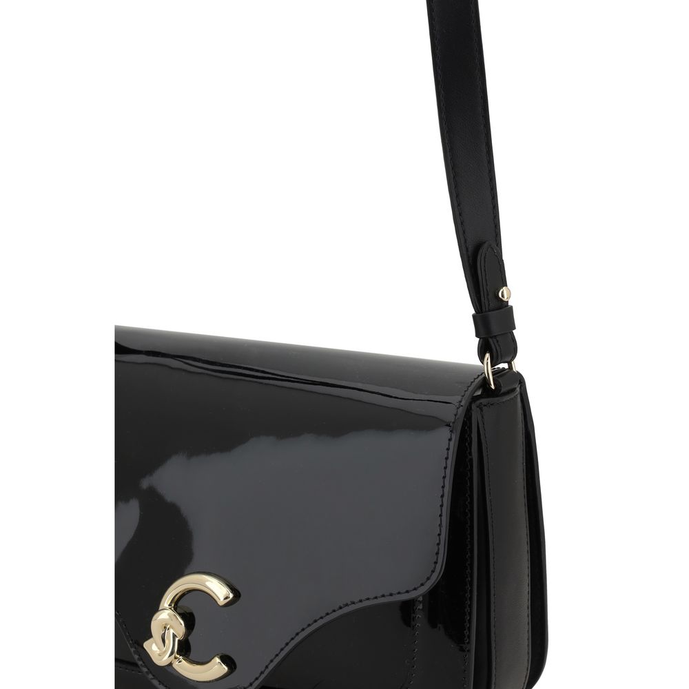 Front view with bag zipped and handles upright.