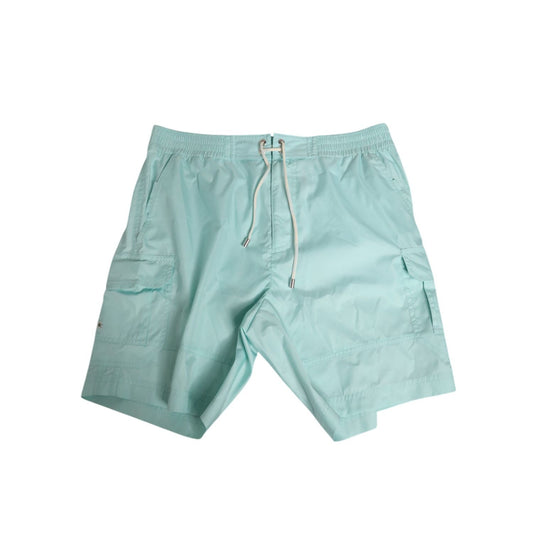 Dolce & Gabbana Aqua Blue Polyester Beachwear Men Shorts Swimwear with drawstring and pockets, ideal for beach or poolside.