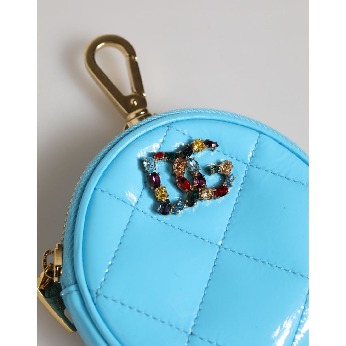 Dolce & Gabbana Azure Blue Leather Round Coin Purse Keychain Crystal Logo Wallet with DG logo and gold hardware clasp