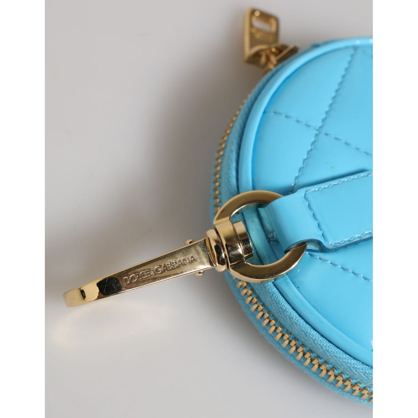 Dolce & Gabbana Azure Blue Leather Round Coin Purse Keychain Crystal Logo Wallet with gold-tone zip and clasp detail
