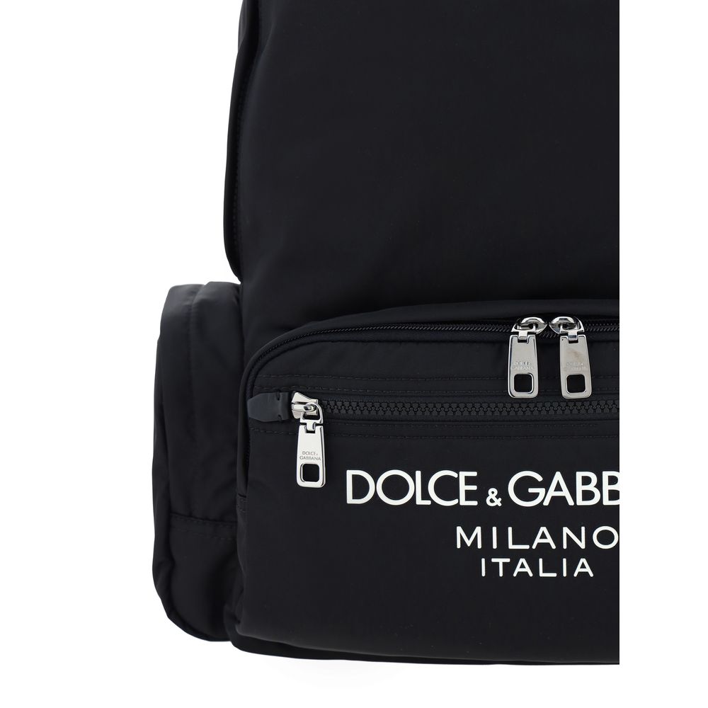 Dolce & Gabbana Backpack with zippered pockets and calfskin leather details, showing iconic brand monogram on the front. AW25 collection.