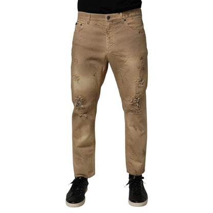 Dolce & Gabbana Beige Cotton Loose Tattered Men Denim Jeans with distressed detailing and a relaxed fit, streetwear-inspired fashion.