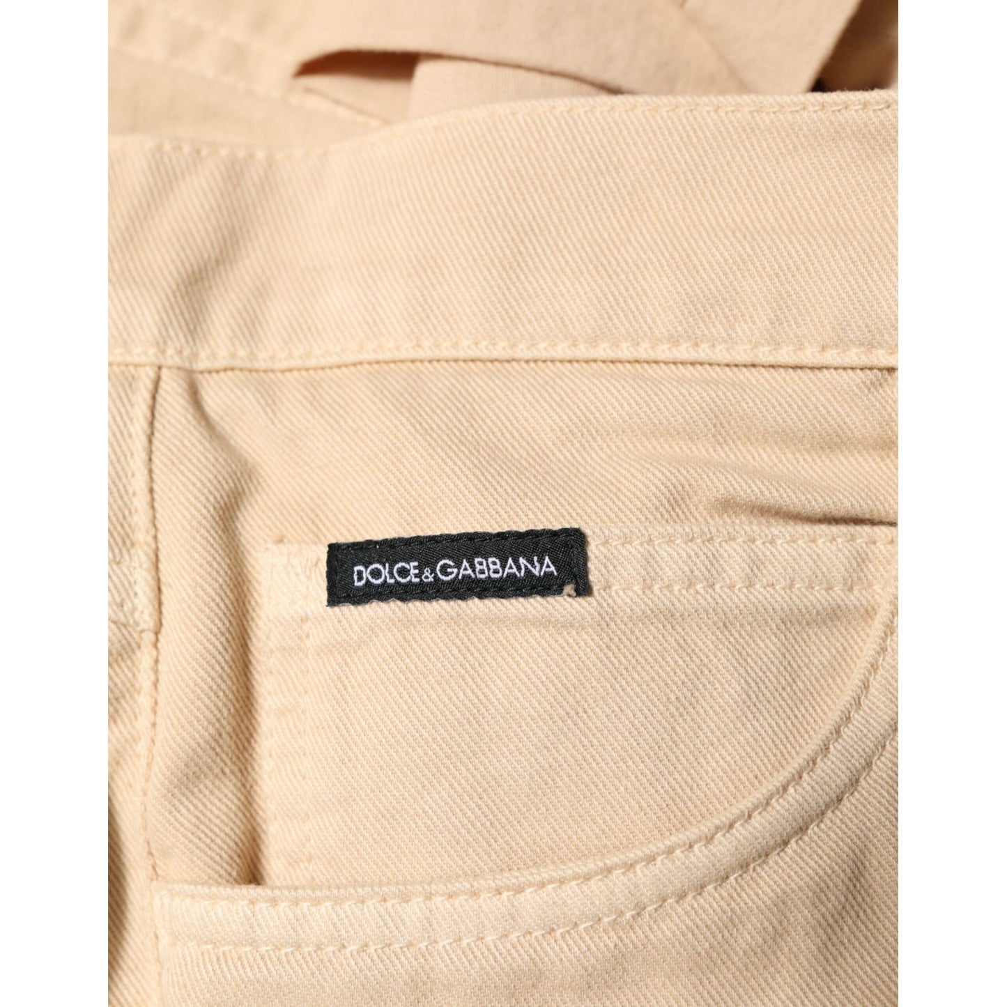 Dolce & Gabbana Beige Cotton Skinny Regular Men Denim Jeans close-up with logo patch