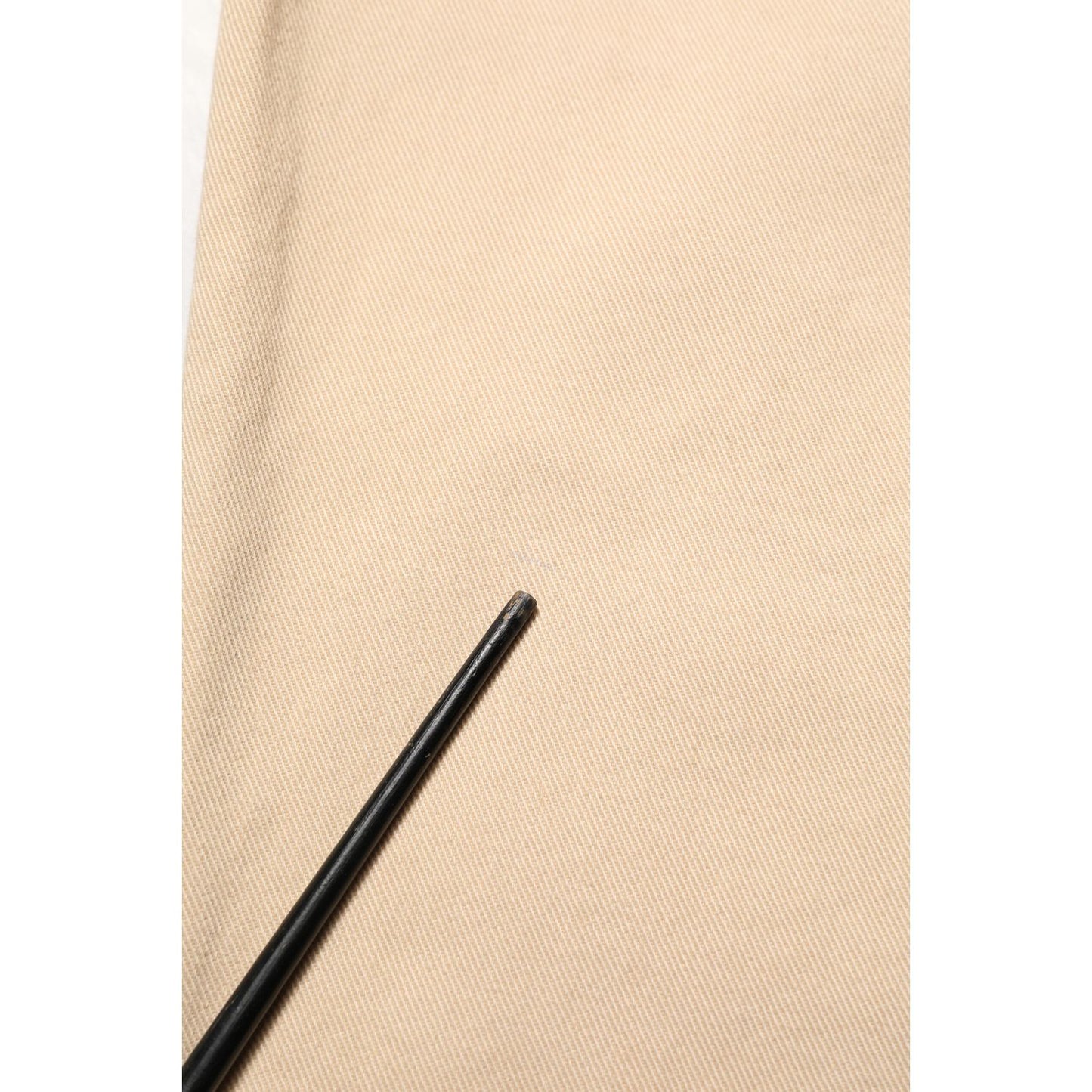 Close-up of fabric from Dolce & Gabbana Beige Cotton Skinny Regular Men Denim Jeans highlighting texture and quality.