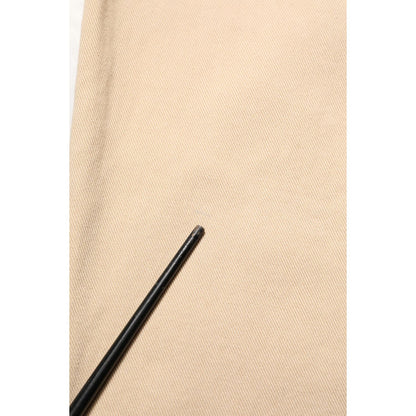 Close-up of fabric from Dolce & Gabbana Beige Cotton Skinny Regular Men Denim Jeans highlighting texture and quality.