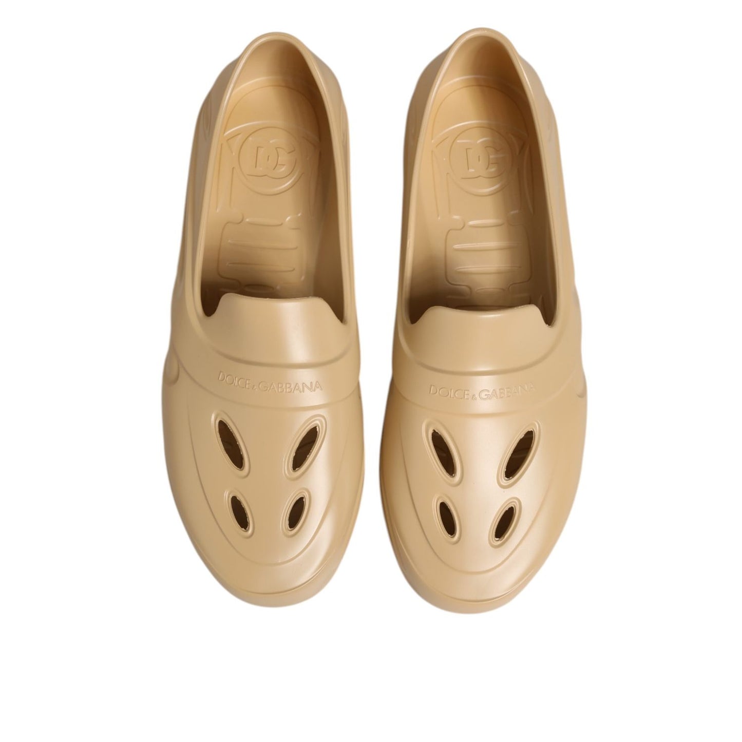Dolce & Gabbana Beige Rubber Slides Low Top Sneakers Shoes with sleek slip-on design, crafted from durable beige rubber with logo details.