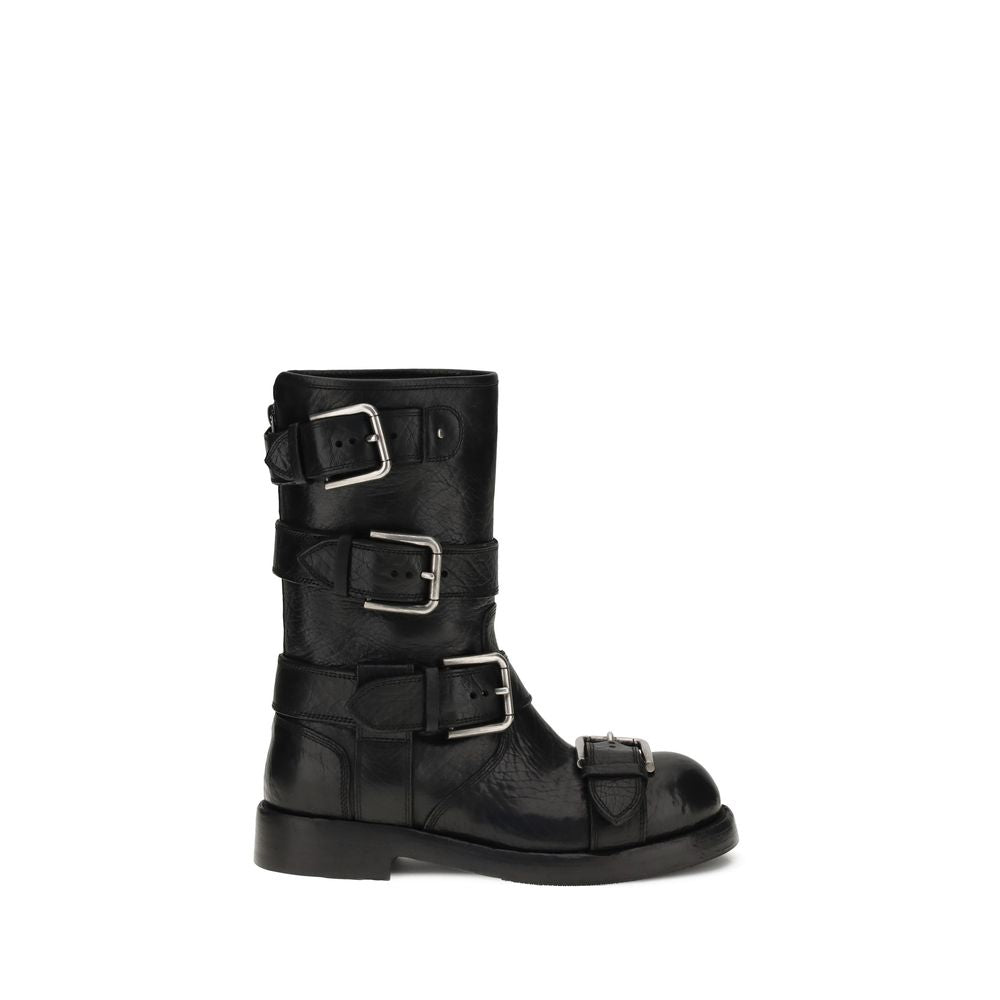 Dolce & Gabbana Black Calf Leather Bos Taurus Lace-Up Boots with buckles and palladium plating, leather sole, and logo tag detail.