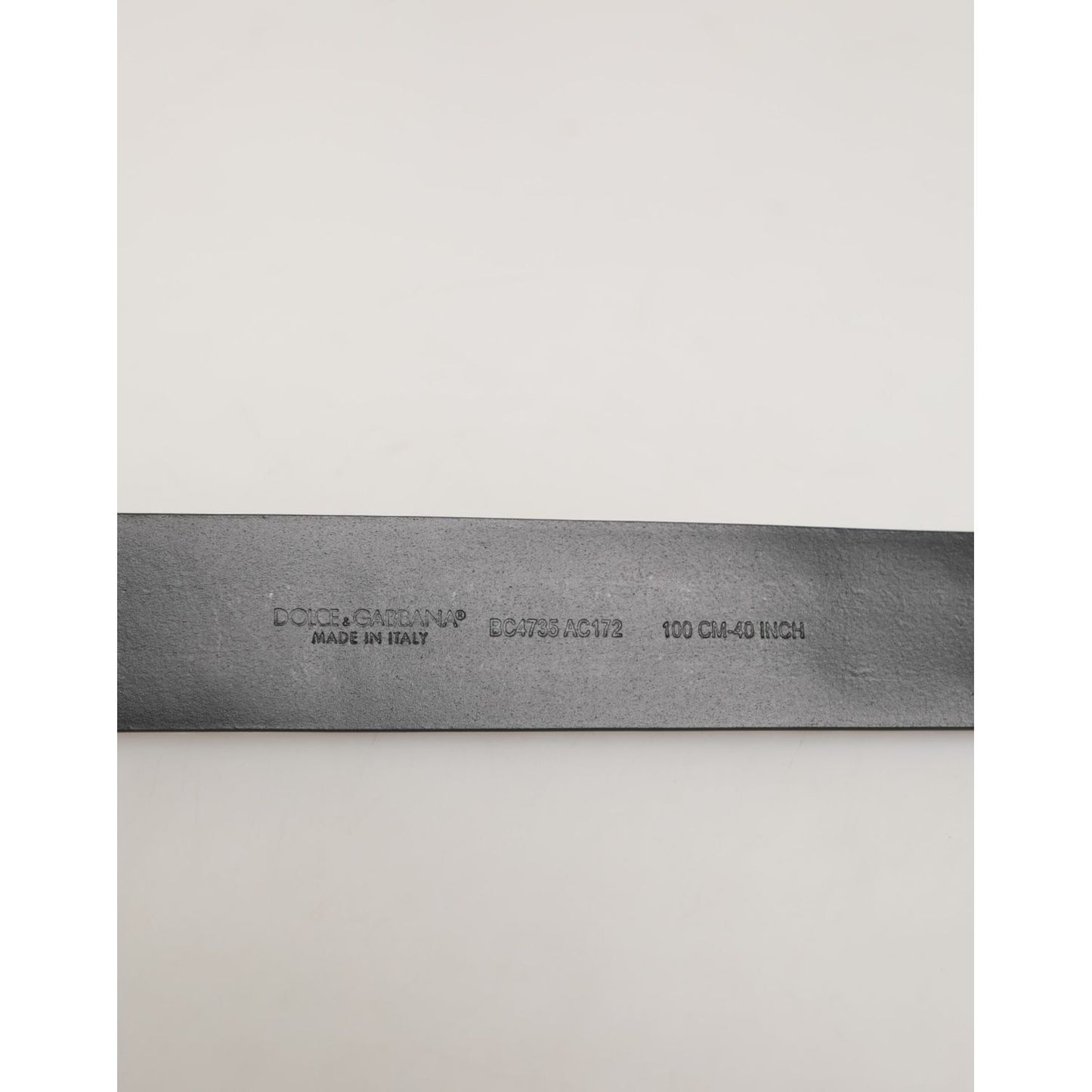 Dolce & Gabbana Black Calf Leather Studded Silver Buckle Belt showing embossed branding details.