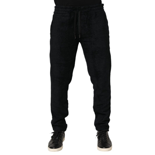Dolce & Gabbana Black Cotton Logo Men Jogger Sweatpants Pants with drawstring waistband and tapered fit, ideal for comfortable streetwear.