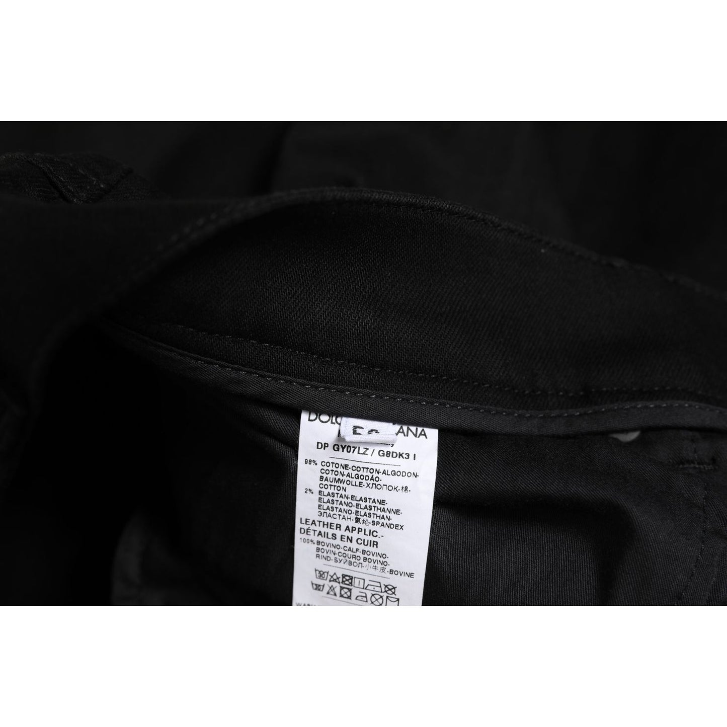 Label of Dolce & Gabbana Black Cotton Skinny Jeans Men Trouser Pants showing material and care instructions.
