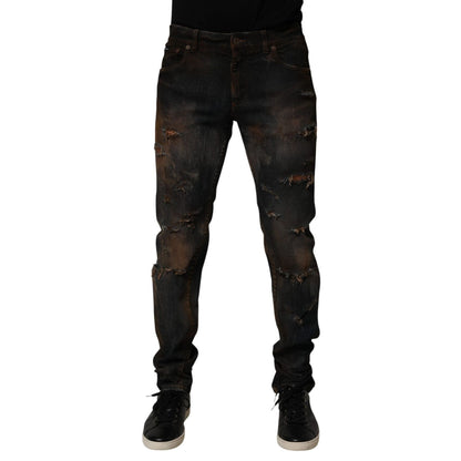 Dolce & Gabbana Black Cotton Skinny Tattered Men Denim Jeans showcasing front view with stylish tattered details and sleek fit.