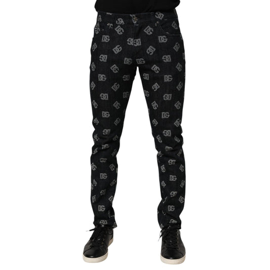 Dolce & Gabbana Black DG Monogram Cotton Skinny Denim Jeans with iconic logo pattern displayed on male model.