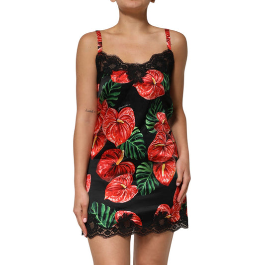 Dolce & Gabbana Black Floral Lace Trim Chemise Lingerie Dress featuring red floral print and lace trim, made of 80% silk. Model wearing.