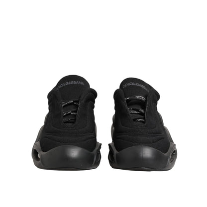 Dolce & Gabbana Black Lace Up Wave Low Top Men Sneaker Shoes, rear view showcasing sleek black design and flexible rubber sole.