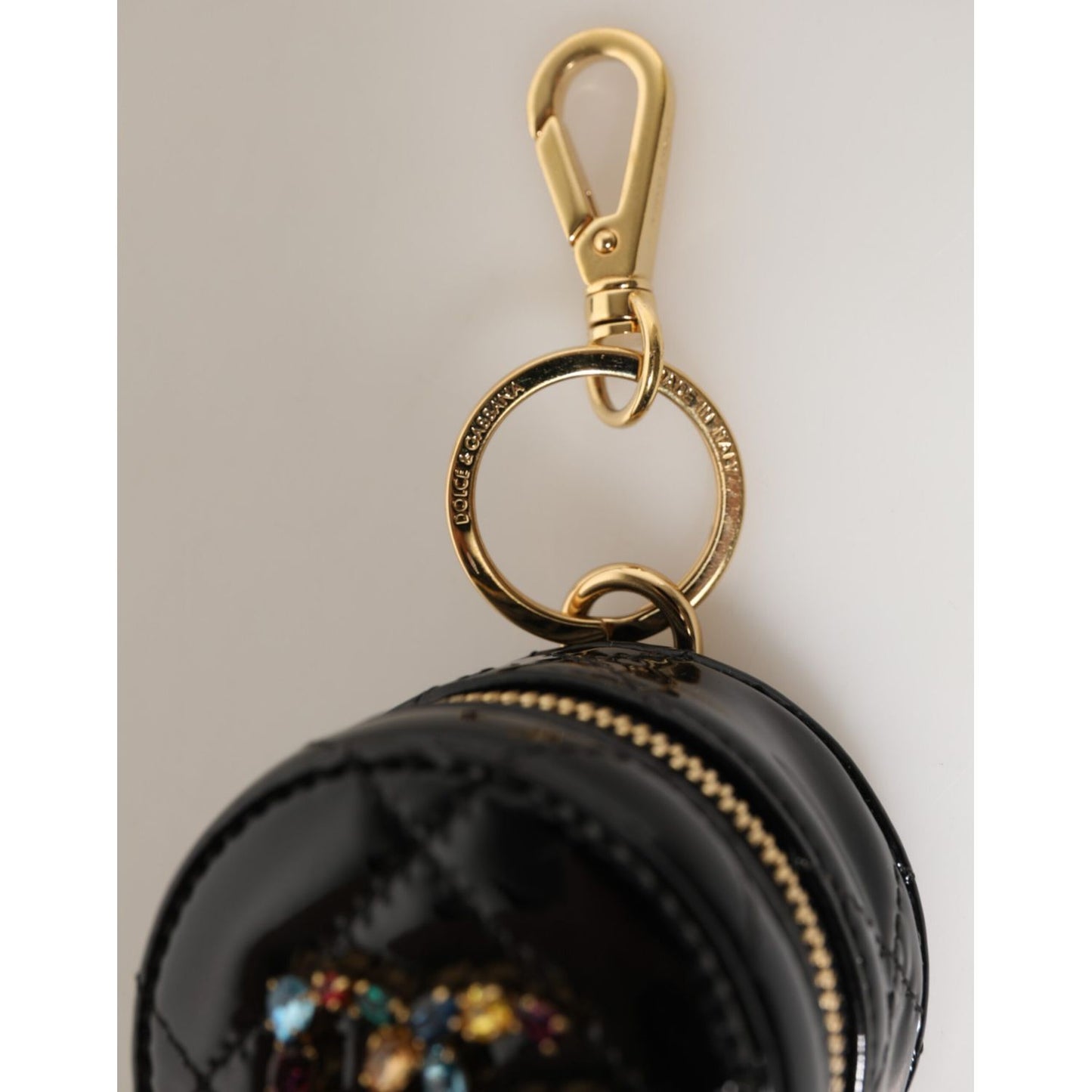 Dolce & Gabbana Black Lamb Leather DG Crystal Logo Round Coin Purse Wallet with gold key ring and crystal logo detail.