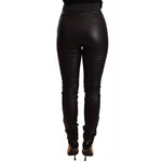 Back view of Dolce & Gabbana Black Leather Elastic Waist Trouser Pants, slim fit with repaired rip and logo details showing.