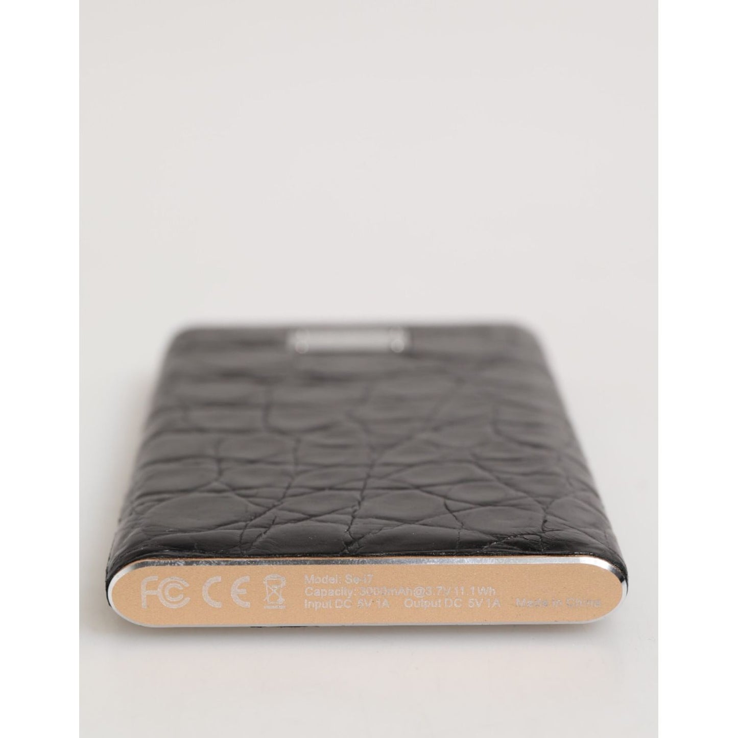 Dolce & Gabbana Black Leather Embossed Skin 3000mAh Power Bank Charger USB with black exotic textured leather finish.