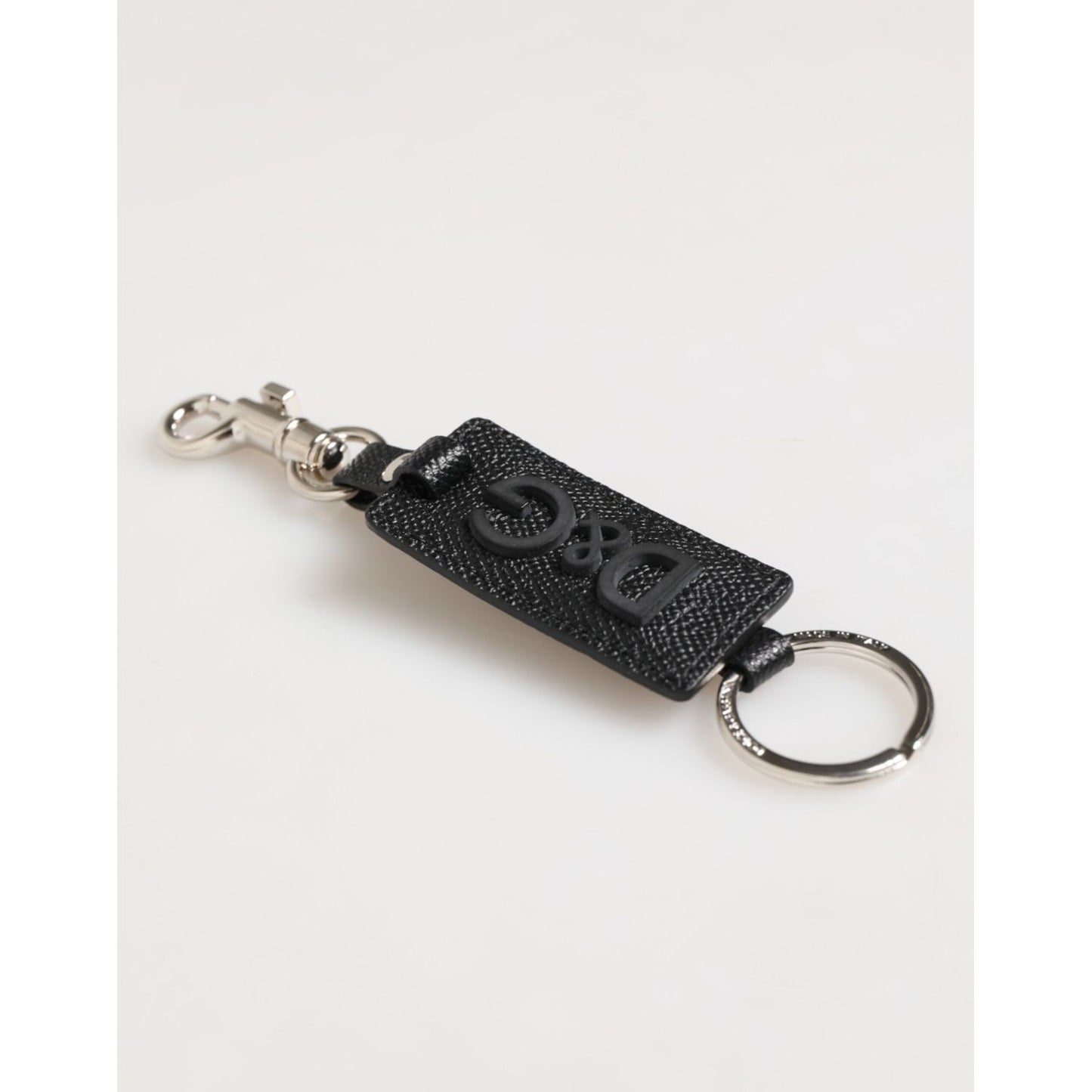 Dolce & Gabbana Black Leather Logo Metal Ring Keychain Holder Keyring with silver detailing on white background.