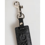 Dolce & Gabbana Black Leather Logo Metal Ring Keychain Holder Keyring with silver clasp on white background