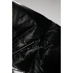 Close-up of Dolce & Gabbana Black Logo Full Zip Hooded Quilted Jacket showcasing the sleek black quilted material and design details.