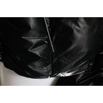 Close-up of Dolce & Gabbana Black Logo Full Zip Hooded Quilted Jacket with quilted black fabric.