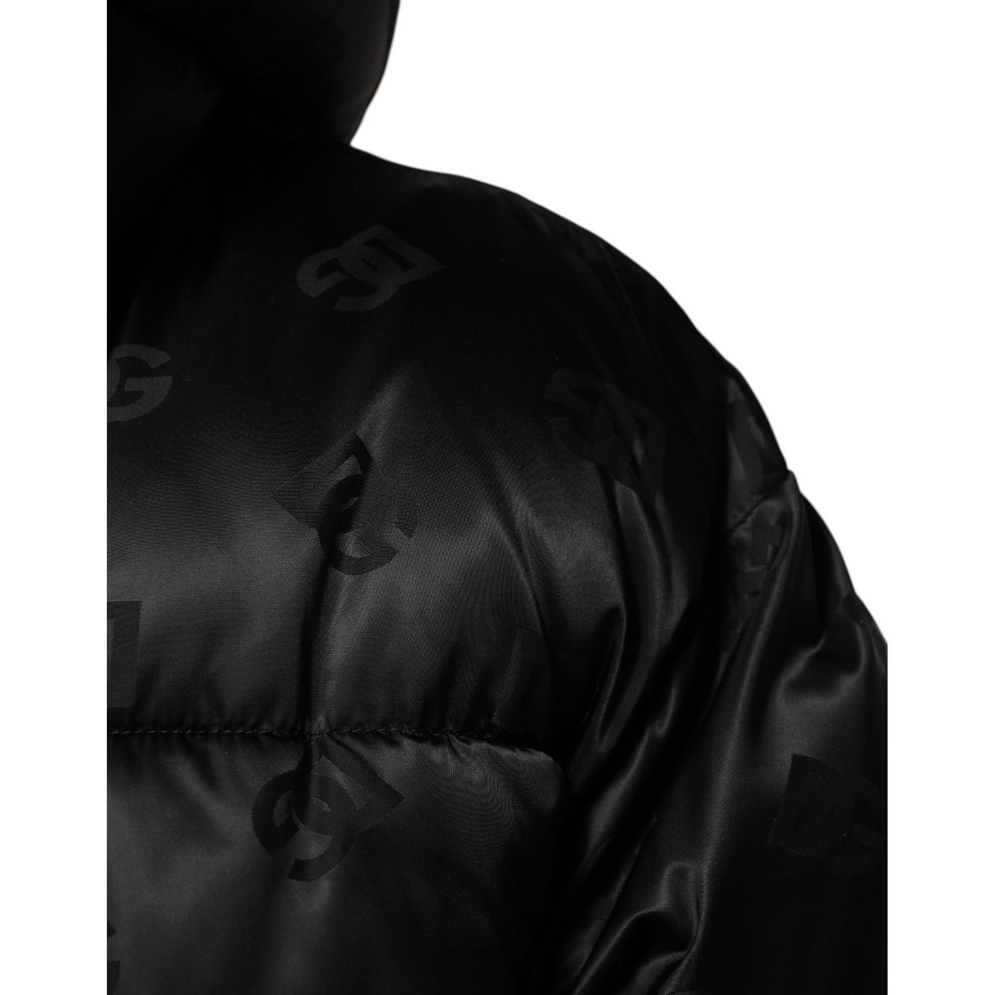 Dolce & Gabbana Black Monogram Logo Puffer Nylon Hooded Jacket detail view showcasing subtle DG monogram design on nylon fabric.