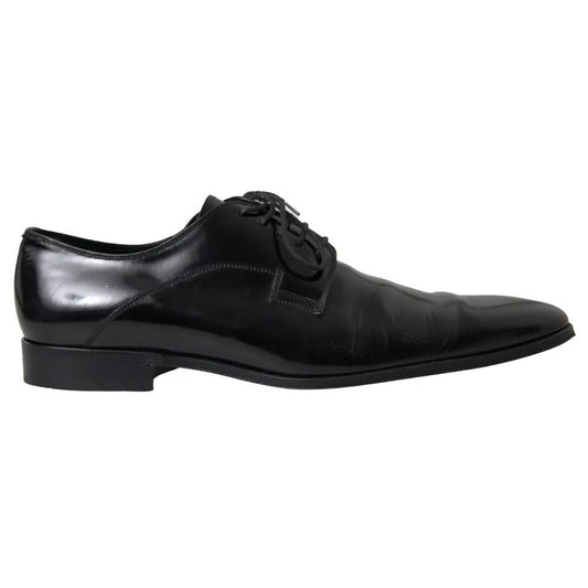 Dolce & Gabbana Black Polished Leather Formal Dress Shoes with logo details, exclusive Italian craftsmanship, slightly preowned.