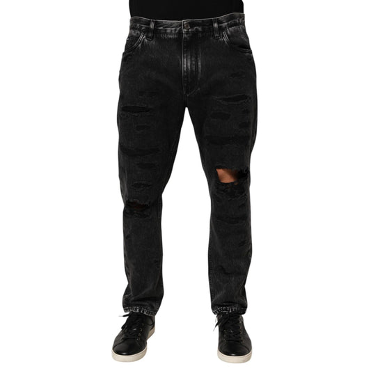 Dolce & Gabbana Black Washed Ripped Loose Cotton Denim Jeans with distressed design and relaxed fit, front view.
