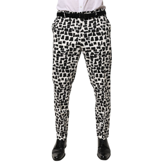 Dolce & Gabbana Black White Abstract Print Cotton Blend Pants with an artistic brushstroke pattern, tailored fit displayed front view.