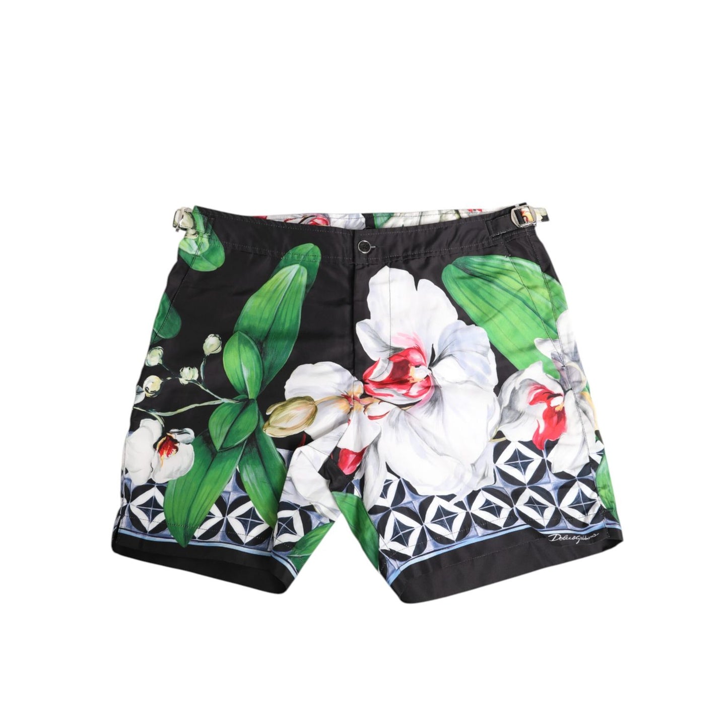 Dolce & Gabbana Black White Polyester Floral Orchid Print Shorts featuring a vibrant orchid floral design on a geometric black base.