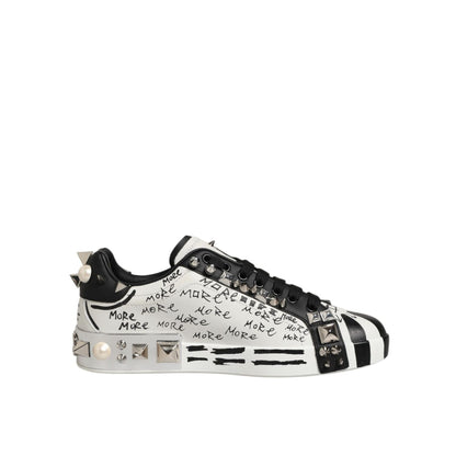 Dolce & Gabbana Black White Studded Low Top Sneakers Shoes with metallic embellishments and graphic details on side view.