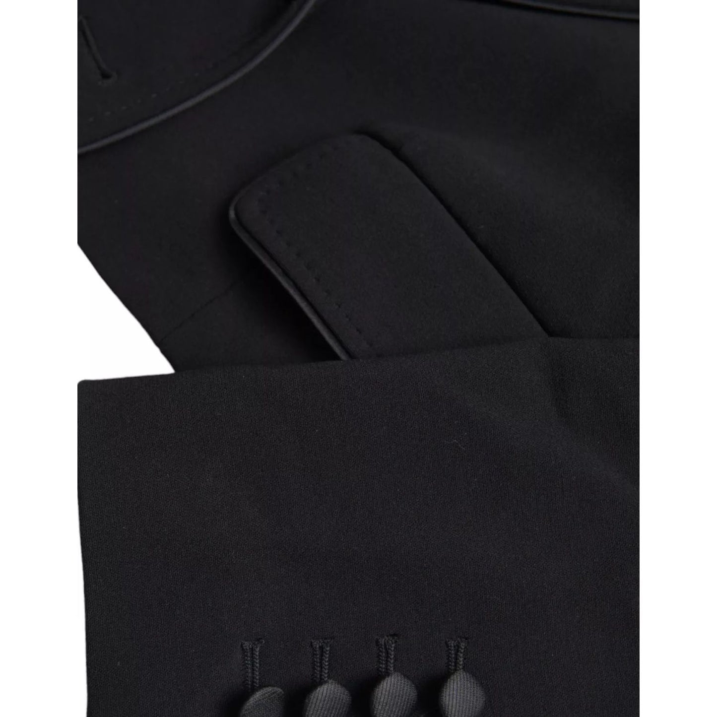 Close-up of Dolce & Gabbana Black Wool Single Breasted Cropped Jacket showing fine craftsmanship and button details.