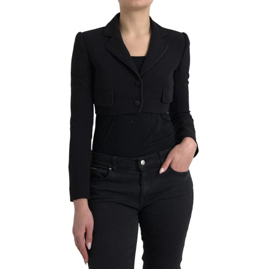 Dolce & Gabbana Black Wool Single Breasted Cropped Jacket on model, featuring notch lapels and flap pockets.