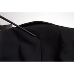 Back view of Dolce & Gabbana Black Wool Single Breasted Cropped Jacket showcasing fabric detail.